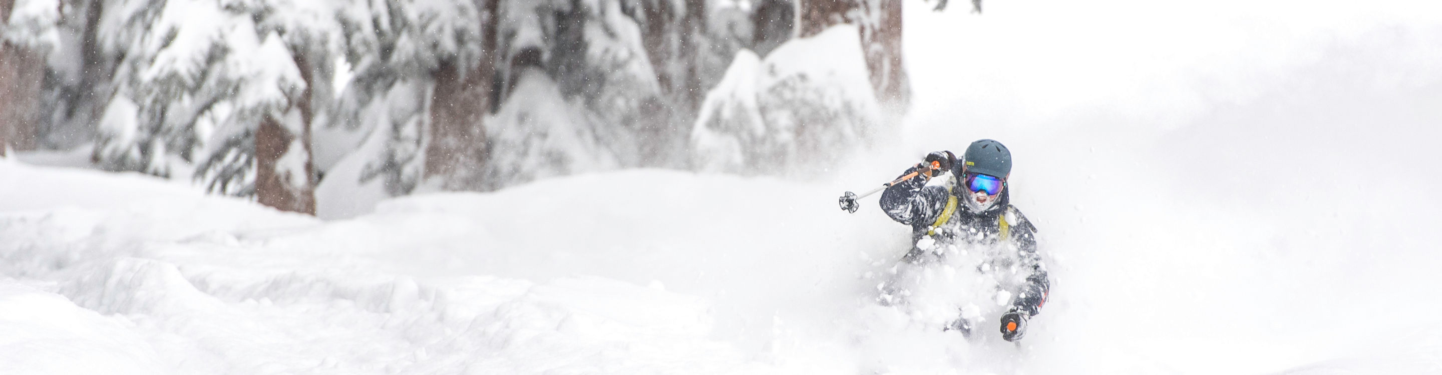 Skier enjoys deep powder in Kirkwood, CA.