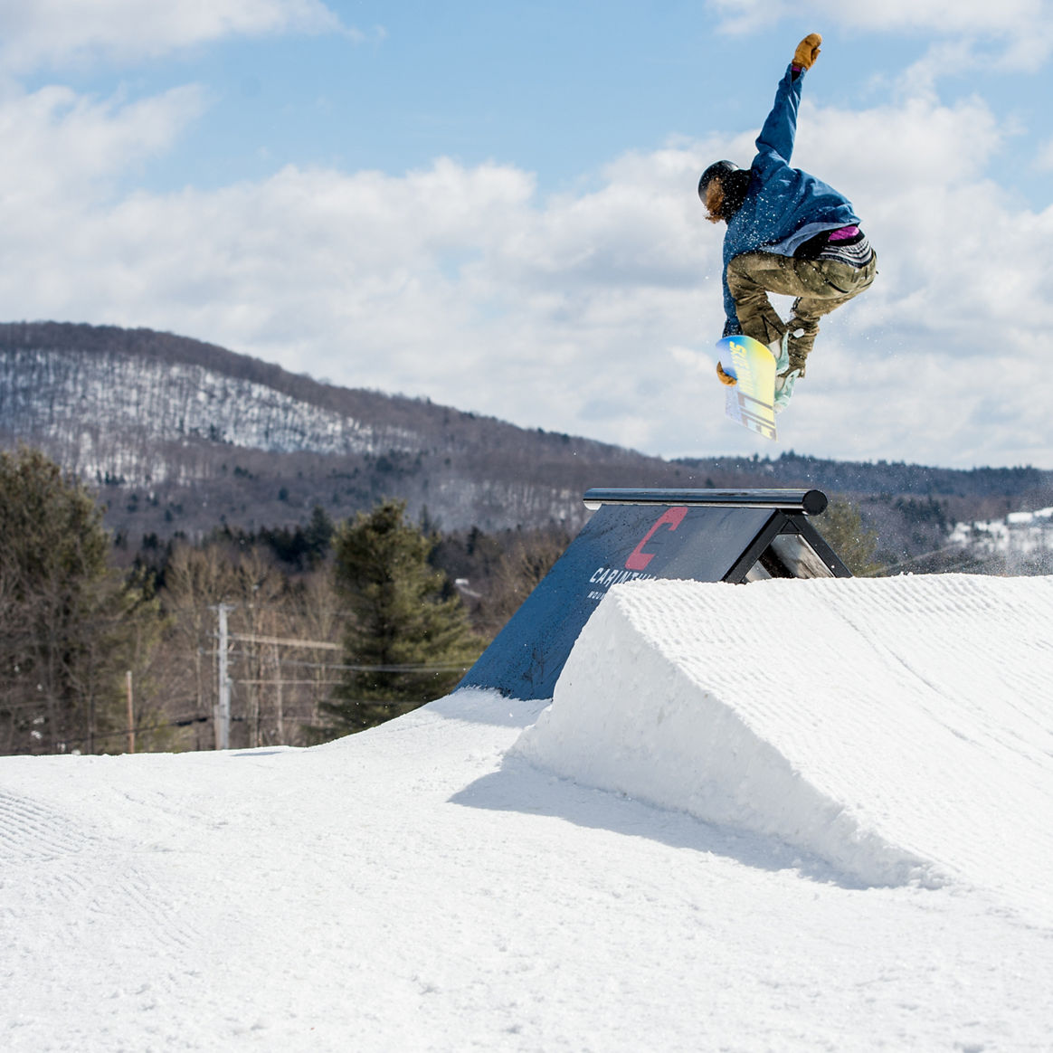 Snowboarder Hits Jump at Carinthia Terrain Park at Mount Snow