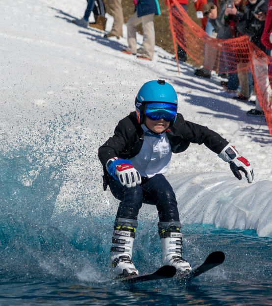 Boy Participates in the Pond Skim at Whitetail