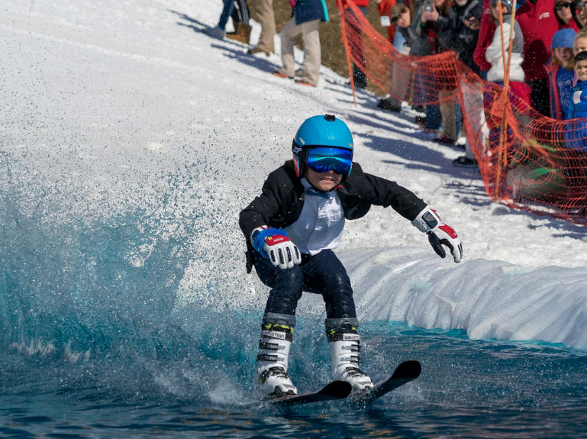 Boy Participates in the Pond Skim at Whitetail