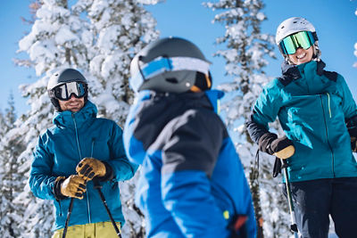 Young family enjoys skiing together at Northstar California Resorts