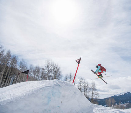 Skiers in the terrain park at Crested Butte, CO.