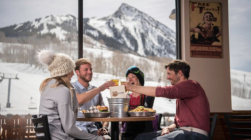 Friends dine at Butte 66 restaurant in Crested Butte, CO.