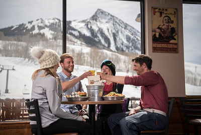 Friends dine at Butte 66 restaurant in Crested Butte, CO.