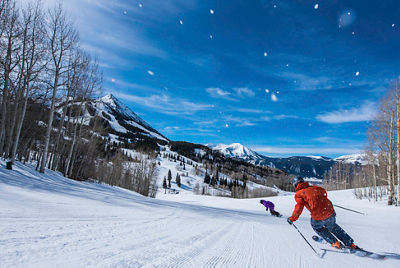 Friends enjoy a freshly groomed trail in Crested Butte, CO.
