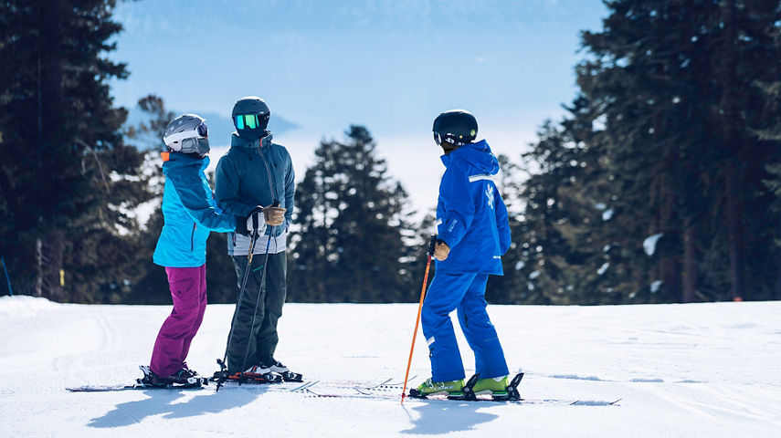 Couple wears masks during ski lesson at Northstar California Resort