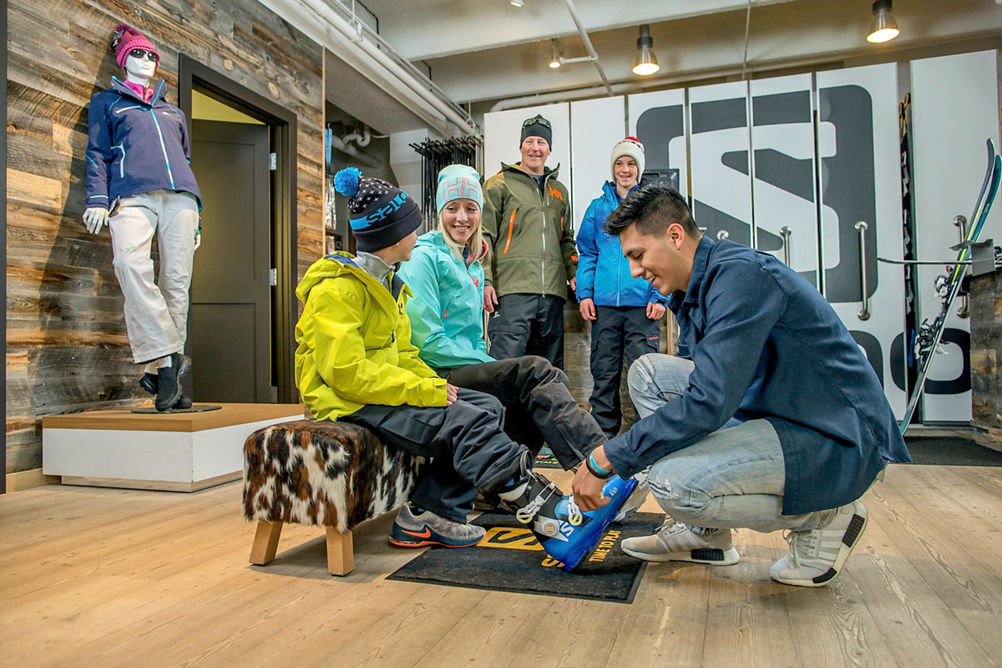 Family shopping at Vail Sports in Vail, CO.