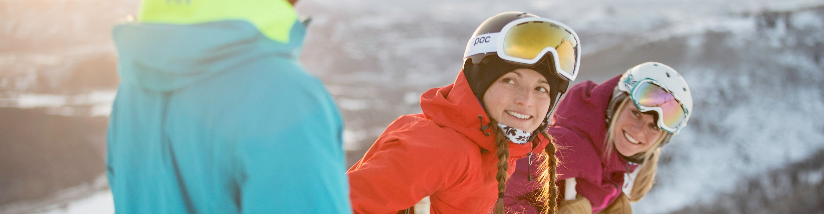 Friends ski together under the sun in Park City, UT.