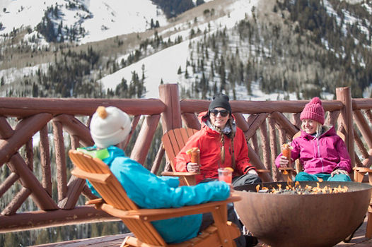 Friends enjoy apres at Lookout Cabin in Park City, UT.