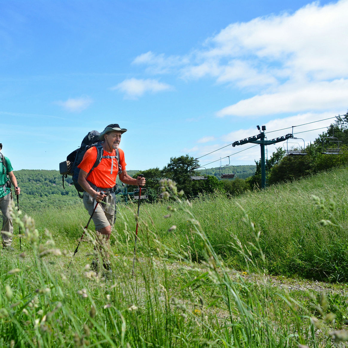 Men Enjoy Summer Time Hiking at Seven Springs