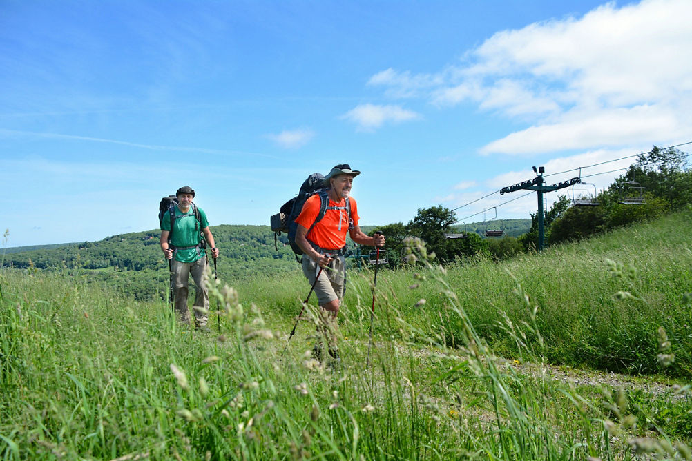 Men Enjoy Summer Time Hiking at Seven Springs