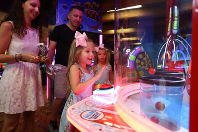 Family Plays Arcade Games at Seven Springs