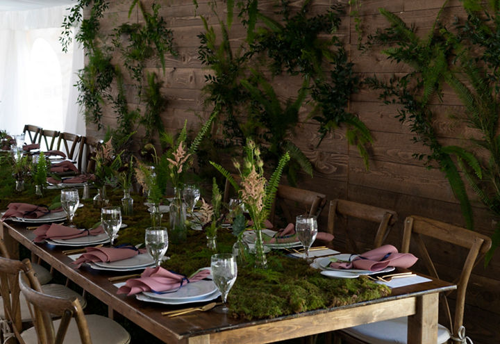 Wedding venue table with dishes and no guests at Ten Peaks