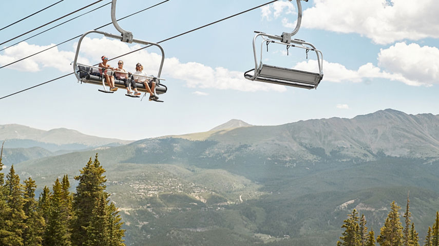 Friends on scenic chairlift ride at Breckenridge