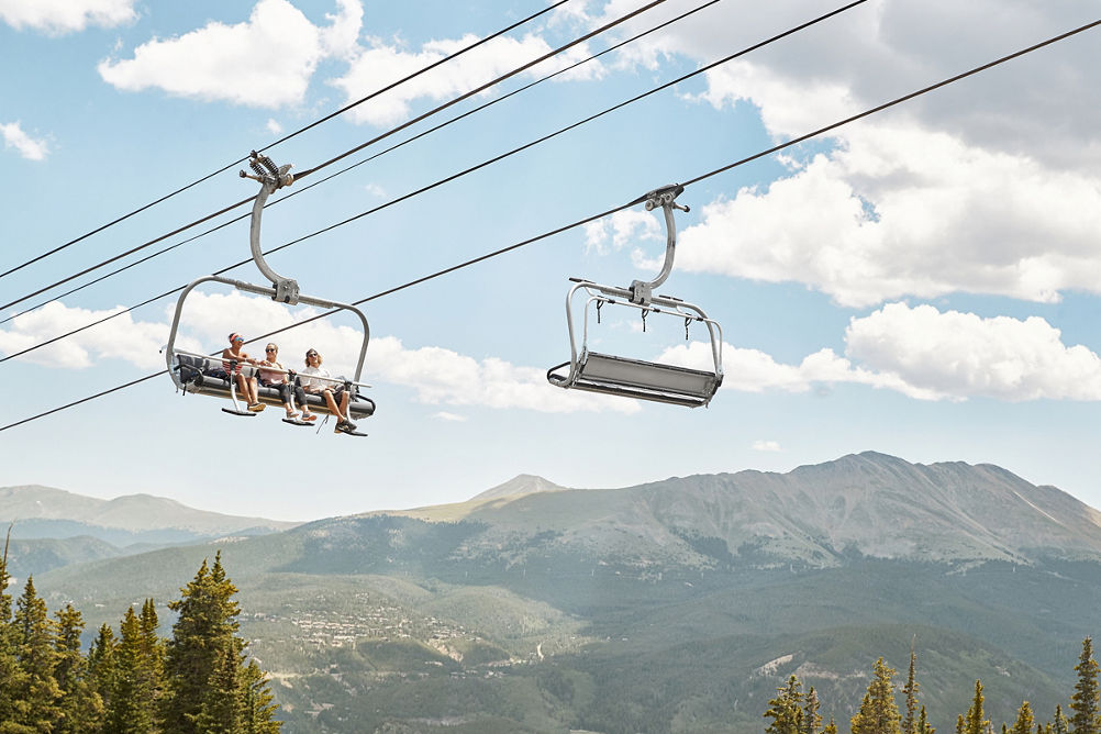 Friends on scenic chairlift ride at Breckenridge