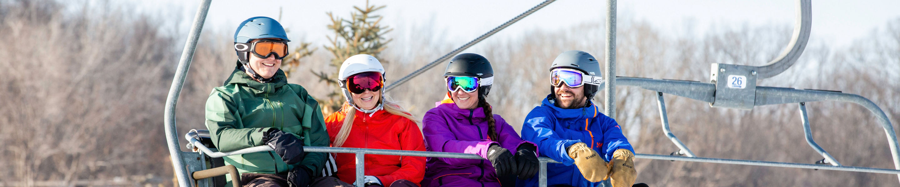 Group of friends enjoy snowboard experience in Mt. Brighton, MI.