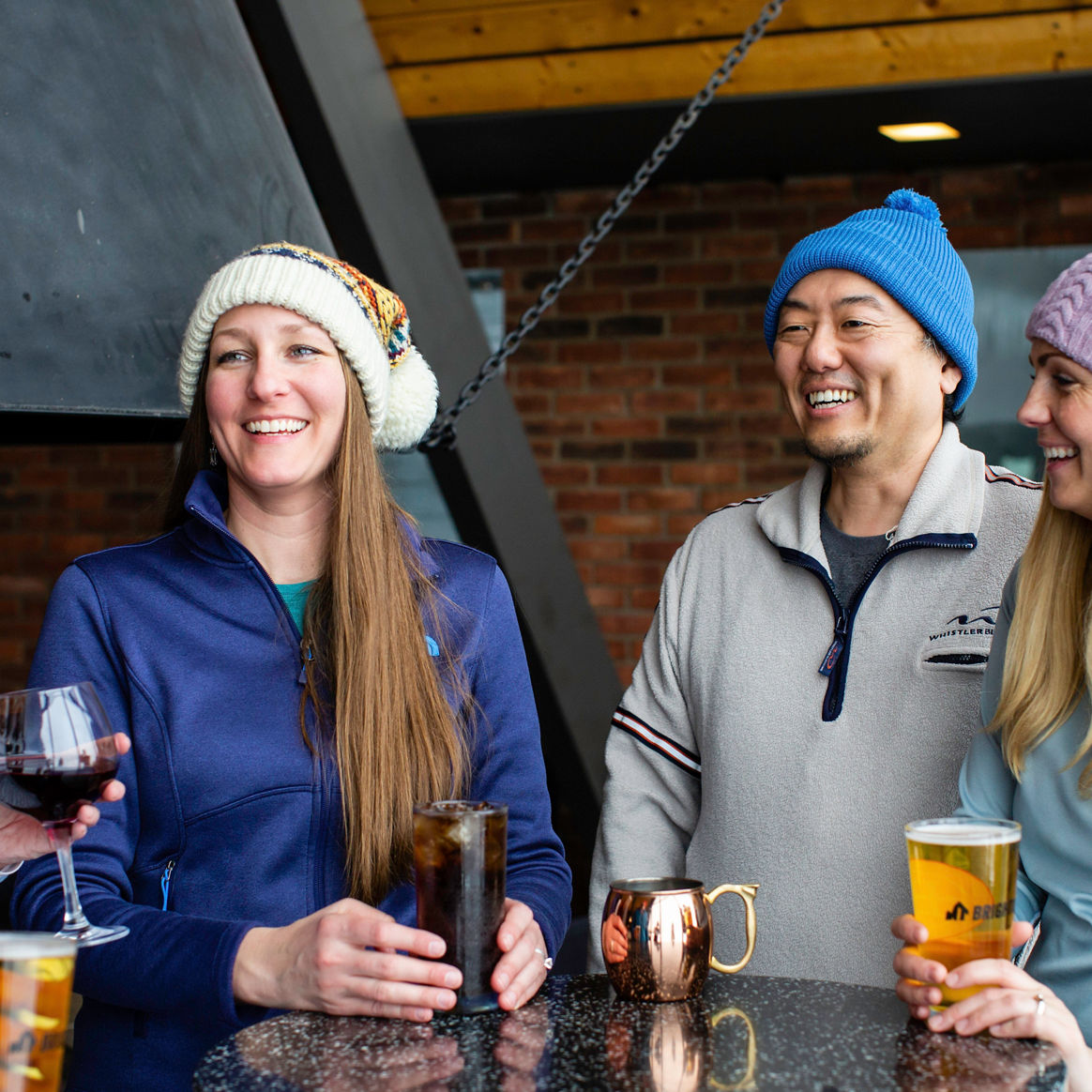 Friends enjoy apres beverages in Mt. Brighton, MI.