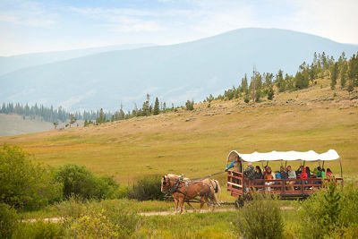 Scenic horse drawn wagon ride in Keystone, CO.