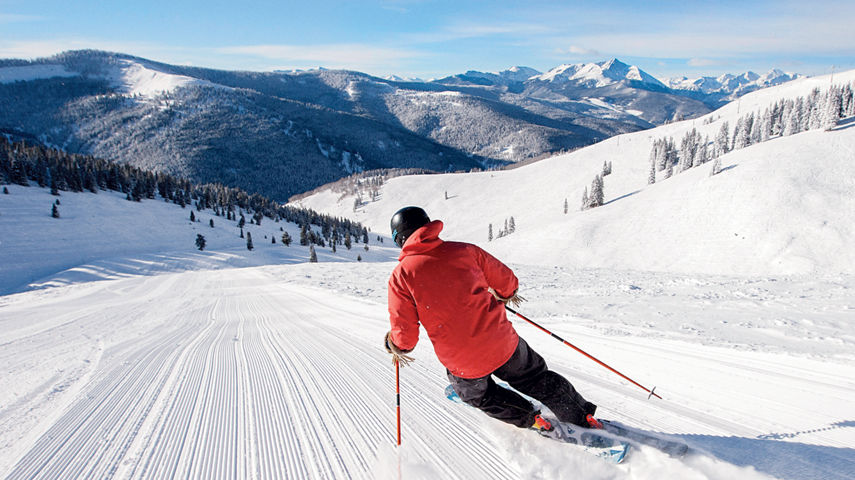 Skier skiing down Vail Mountain