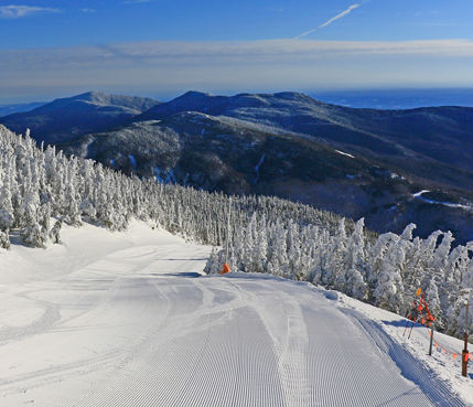 First tracks on groomed corduroy trail in Stowe, VT.