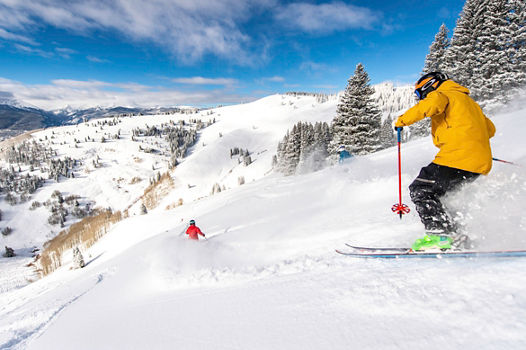 Skiing in the Back Bowls in Vail, CO.