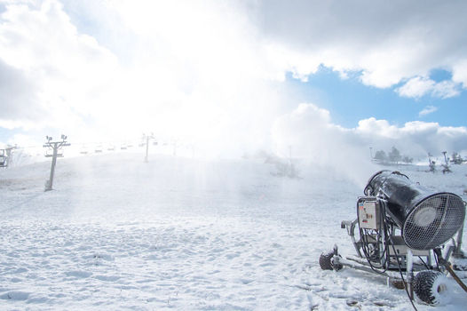 Snow Guns Fire into the Sunshine at Boston Mills