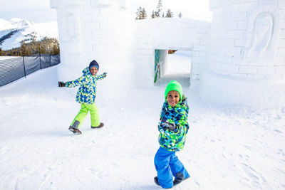 Family enjoys the opening of the Kidtopia snow fort in Keystone, CO. 