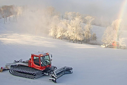 Snowcat Grooms Ski Run at Hidden Valley