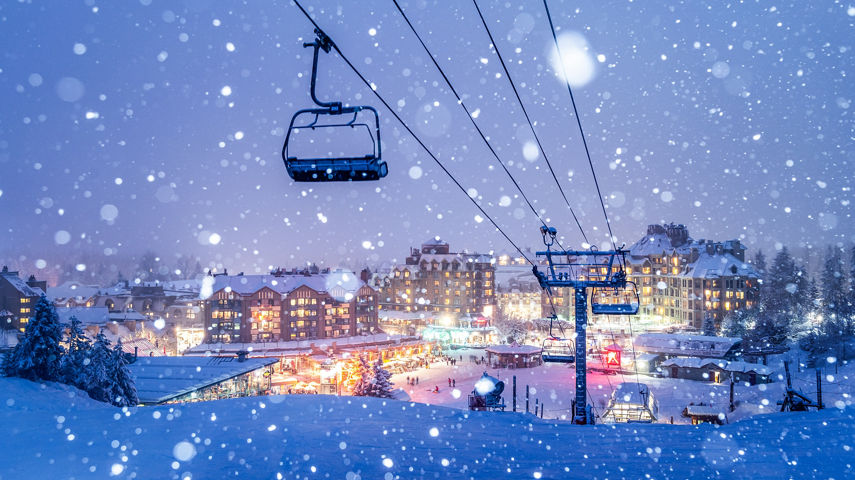 Snowy Whistler Village Glowing at Night