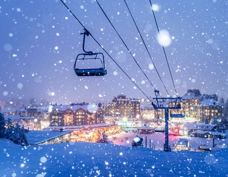 Snowy Whistler Village Glowing at Night
