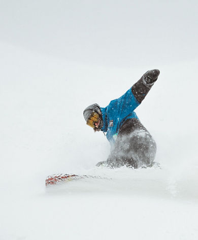 Snowboarder Makes Quick Stop in Fresh Powder at Boston Mills