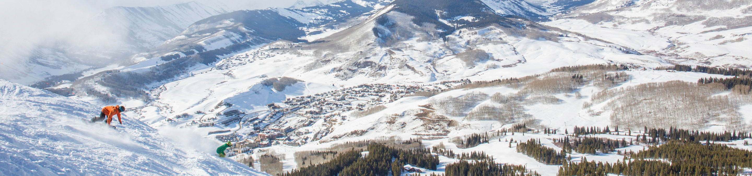 Snowboarding in fresh snow in Crested Butte, CO.