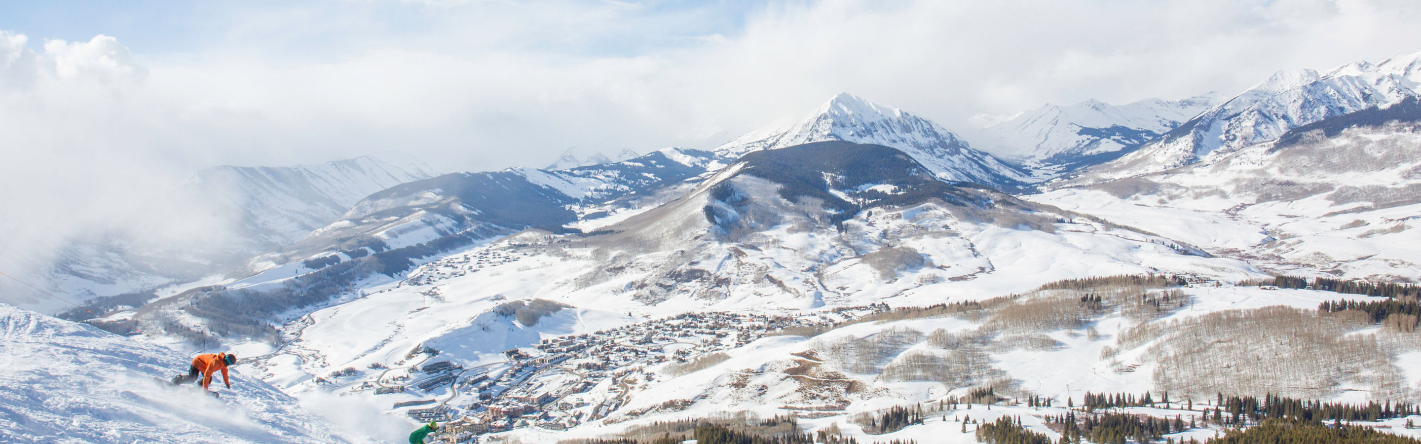 Snowboarding in fresh snow in Crested Butte, CO.
