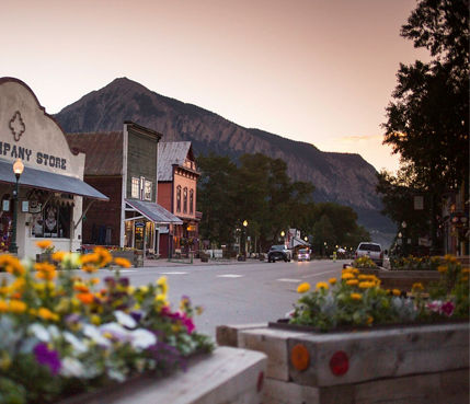 View of the town under the peak at dusk in Crested Butte, CO.
