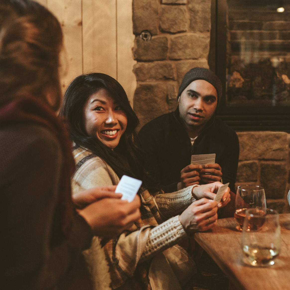 Friends Playing Cards at Basecamp Hotel, South Lake Tahoe, CA.