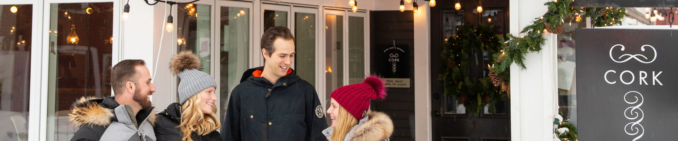 Couples meet up at local restaurant, Cork, in Stowe, VT.