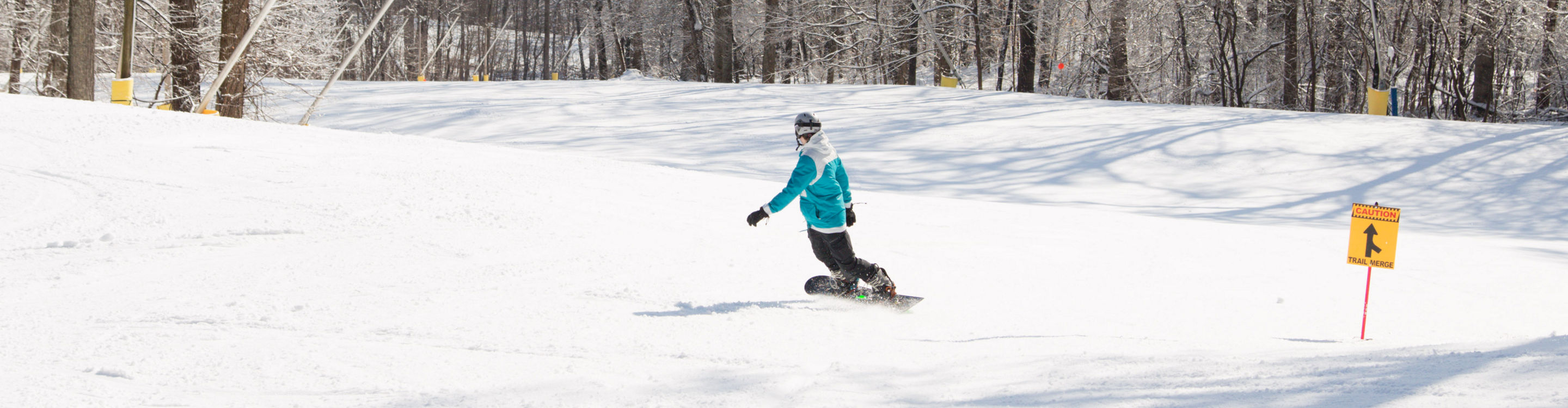 Snowboarder Looks Out Over the Valley at Liberty Mountain