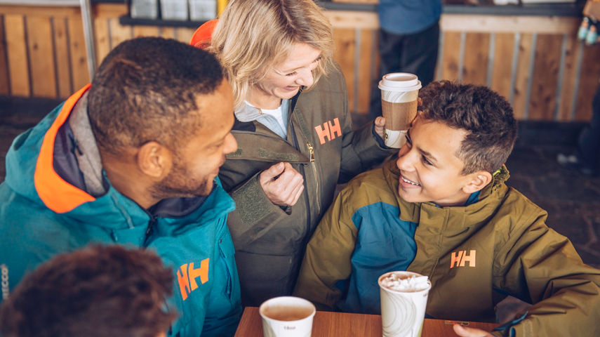 Family enjoying food and drinks at Summit Smokehouse in Northstar California