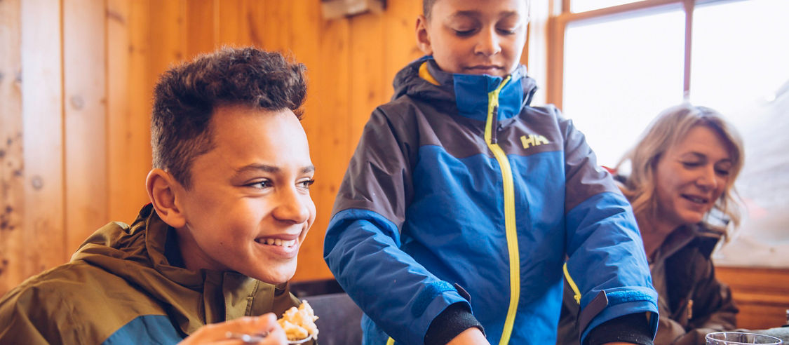 Family enjoying food and drinks at Summit Smokehouse in Northstar California