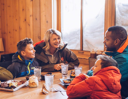Family enjoying food and drinks at Summit Smokehouse in Northstar California