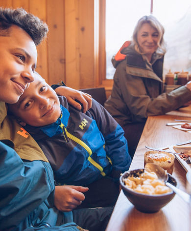Family enjoying food and drinks at Summit Smokehouse in Northstar California