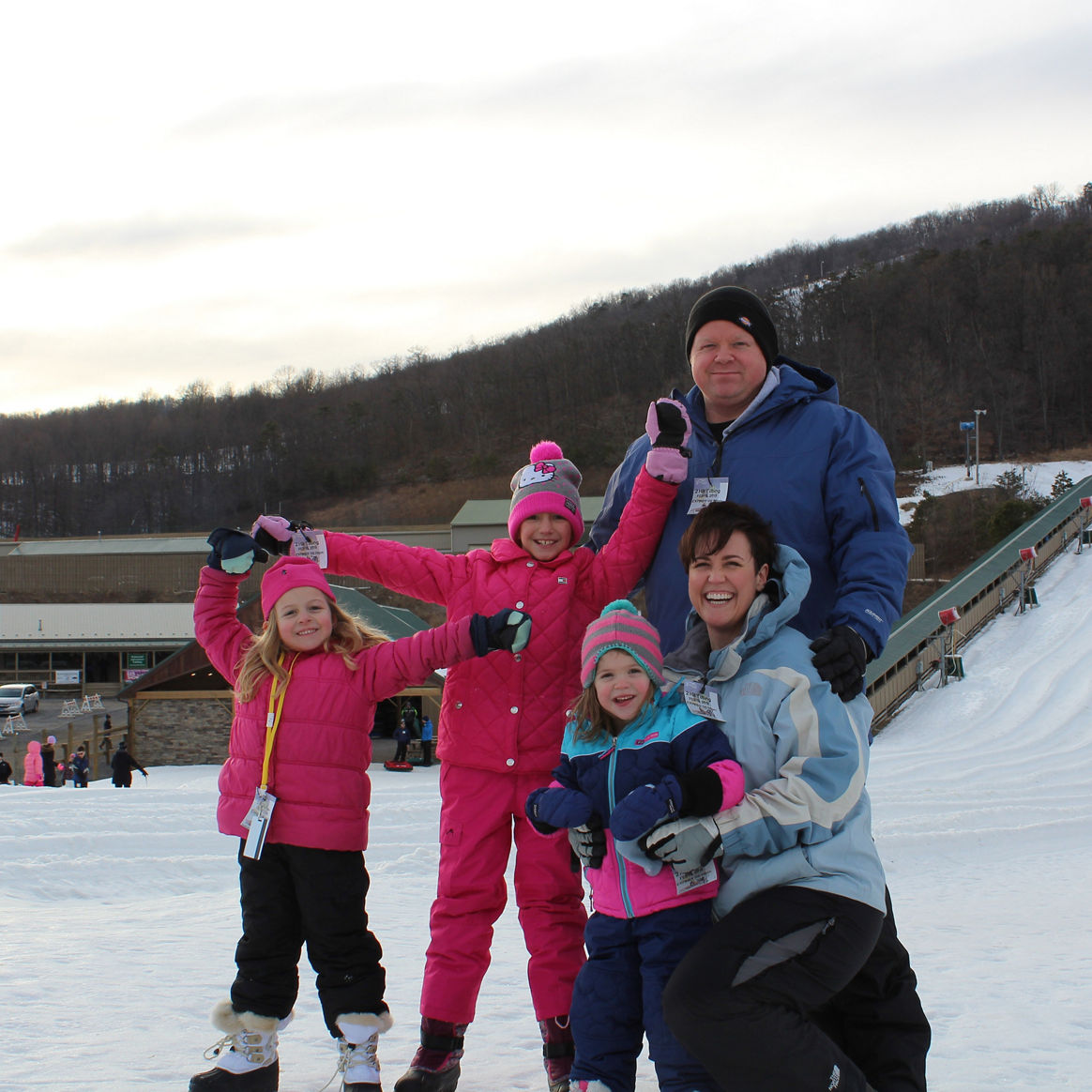Family Poses After Tubing at Whitetail