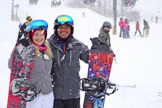 Two Snowboarders Pose on Ski Run at Mad River Mountain