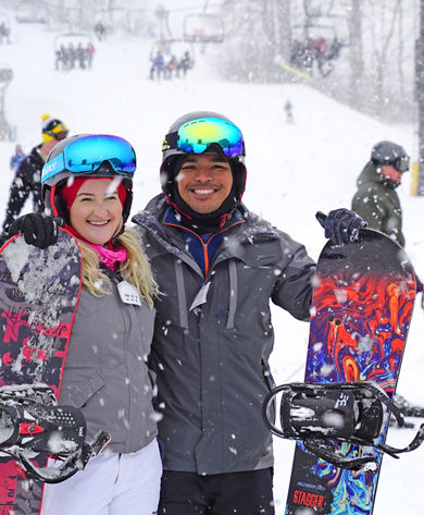 Two Snowboarders Pose on Ski Run at Mad River Mountain