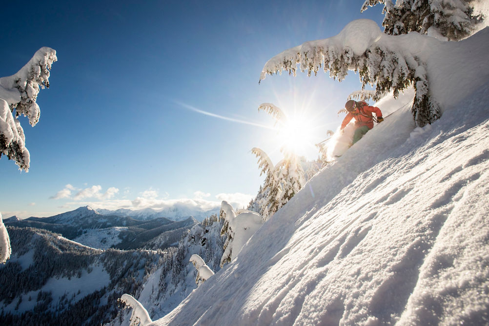 Woman Skiing Powder at Cowboy Turn at Stevens Pass