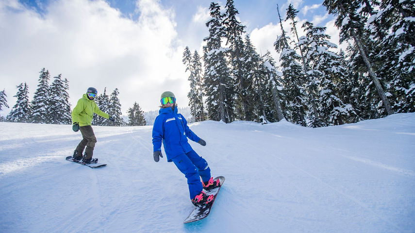 Intermediate Snowboarder Turn Ski and Ride School at Stevens Pass