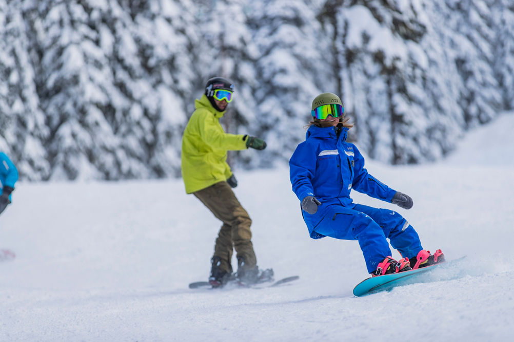 Snowboarder Turn Ski and Ride School at Stevens Pass