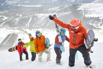 Friends skiing and snowboarding at Breckenridge, CO.