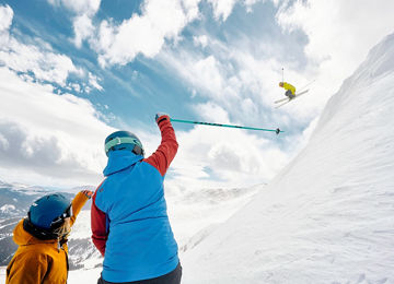 Friends skiing and snowboarding at Breckenridge, CO.