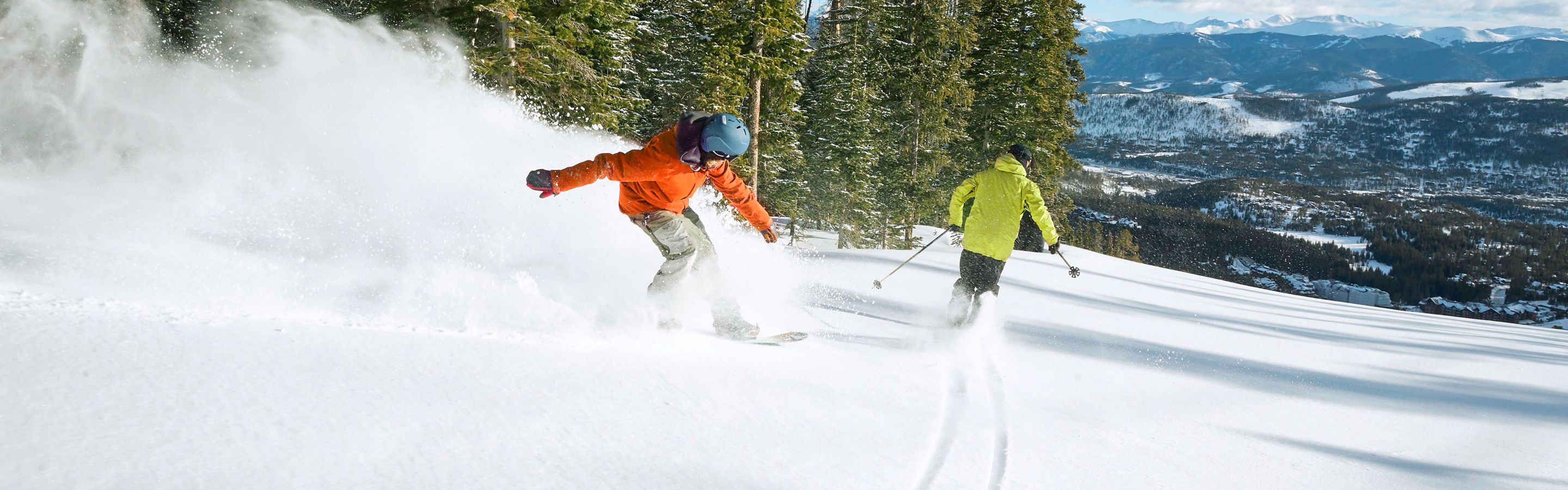 Family skiing and snowboarding at Breckenridge, CO.
